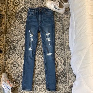 high rise supper skinny ripped jeans. size 24/00